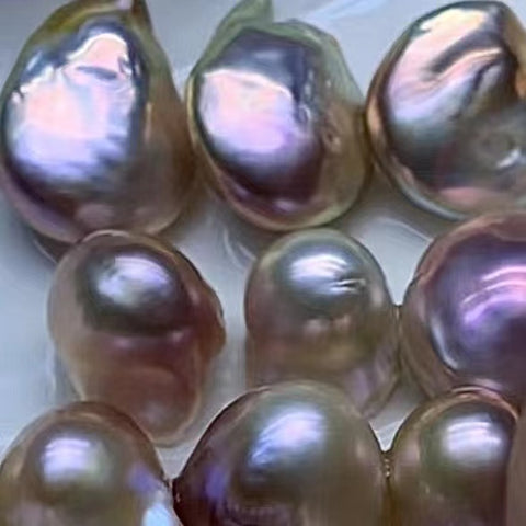 OMG Clam(1 Clam Include 1 UFO Shape Freshwater Pearl and 1 Baroque Freshwater pearl)